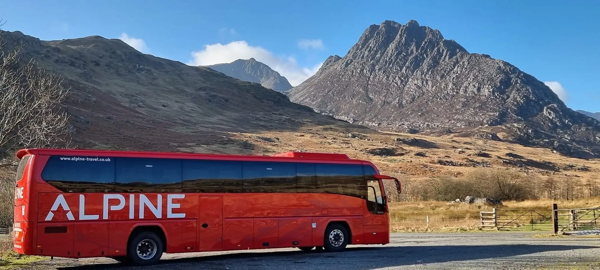 Coach by mountains
