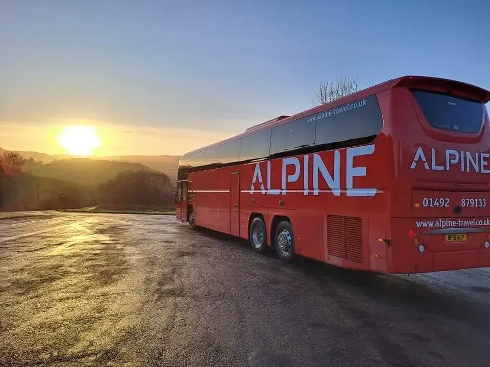 Alpine Coach at Sunset